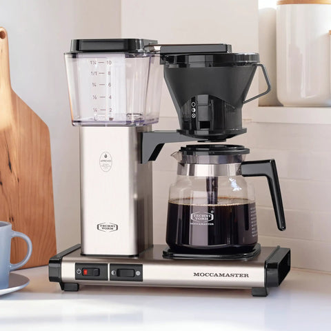 40 Oz Brushed Silver Coffee Brewer With Large Reservoir, kitchen counter view, showing carafe and hot plate, easy drip coffee maker