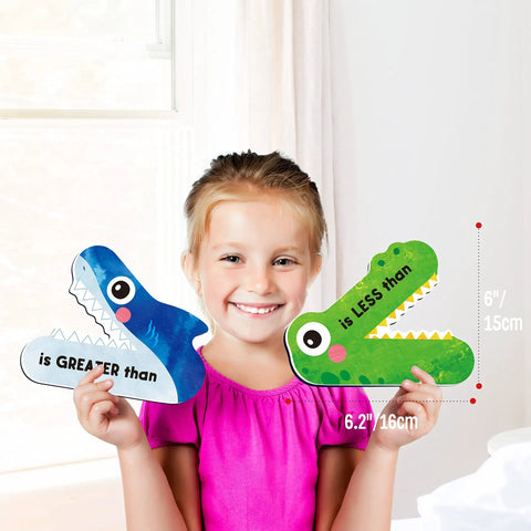 Child holding Magnetic Greater Than Less Than Equal Signs Math Set for classroom demonstrations, hands-on learning tool.