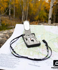 TruArc 20 Luminous Expedition Compass With Glow In The Dark Sighting Tool And Protective Boot Global Needle And Clinometer on map