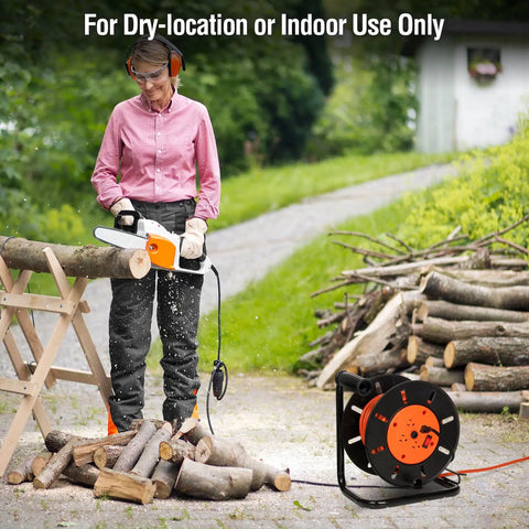 Person using chainsaw next to Extension Cord Storage Reel With Hand Crank, 4 Outlets, 15 Amp Overload Switch, Heavy-Duty Metal Stand.
