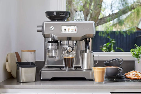 Barista Touch Espresso Machine With Built In Grinder And One Touch Dose Control For Home Baristas on a kitchen counter