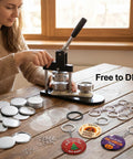 Person using 100 Sets Button Maker Kit With 58mm Shells And 1.98 Inch Keychain Rings on wooden table, with badges and materials displayed.