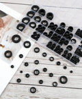 200 Pcs Rubber Grommet Kit Eight Sizes Hollow Firewall Grommets Assortment For Wiring And Cord Management Automotive Grommets Set For Hole Plugs One Quarter To One Inch Durable Automotive Wiring Grommets For Weatherproof Sealing And Cable Management displayed in a divided storage box on a wooden table.