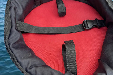 Interior view of Heavy Duty Padded Scuba Regulator Bag With Detachable Shoulder Strap Or Just Carry Handle, showing red lining and straps.