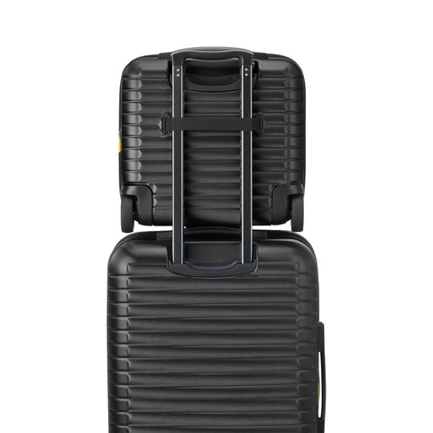 Back view of Cruise 3.0 Hardside Underseater Carry On Luggage with two inline wheels, polycarbonate shell, in black.