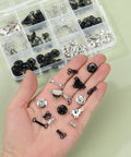 Hand holding components from 180 Piece Hook And Eye Sewing Kit All In One With Buttons And Closures For Skirts Pants And Dresses Fabric Snap Buttons Garment Snaps DIY Craft Essentials In Handy Storage Box