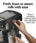 Slide And Lock Espresso Machine With Built In Milk Frother Steam Wand 15 Bar Pump Compact Countertop Coffee Maker smooth frothing wand in use.