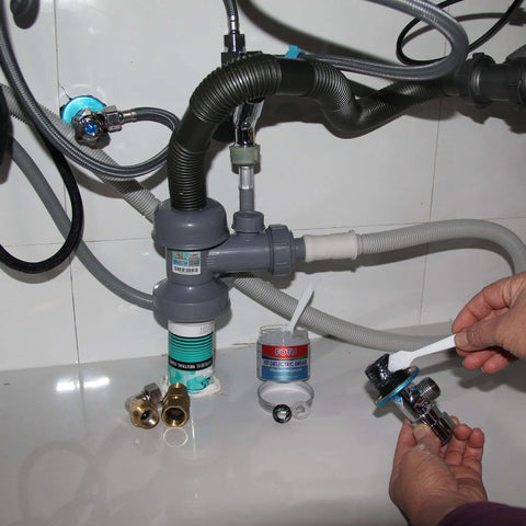 Hands applying dielectric grease for electrical connectors and battery terminals, spark plugs, and O ring seals, waterproof silicone lube for automotive use, 4 oz one pack, heavy duty insulation and moisture protection, to plumbing fittings.