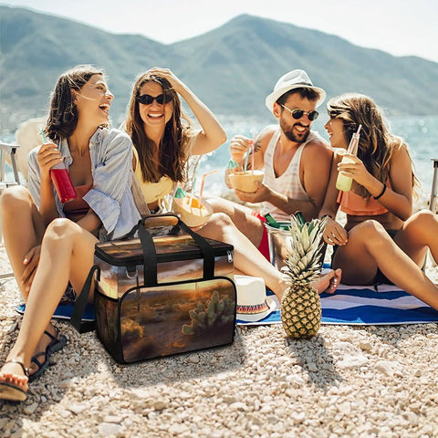 Desert Sunset Cactus Cooler Bag Insulated Lunch Box for Men and Women Small Portable Beach Cooler for travel with group on rocky beach.