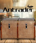 Front view of a wooden chest with black latch hasps on a table, under the Antrader logo.