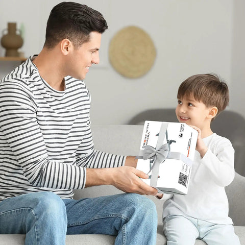 Father and son with Foldable 1080P FPV Drone With Camera For Grownups, Beginners And Kids, Voice Control, Gesture Selfie, Headless Mode, Two Batteries, Up To 30 Minutes Of Flight, Portable Travel Case, Beginner Friendly RC Quadcopter gift box.