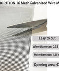 Scissors cutting PVC Coated Galvanized Wire Mesh Two Pack 16 Mesh 8 By 12 Inch 30 By 21 Cm showing material details.