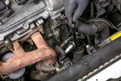 Mechanic using Auto Adjusting Crowfoot Wrench Set Three Piece With Spring Loaded Jaws That Ratchet Each Turn in car engine