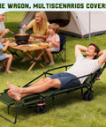 Heavy Duty Folding Wagon 2 In 1 Collapsible Cart Transforming Into Beach Chair rests on grass beside camping family