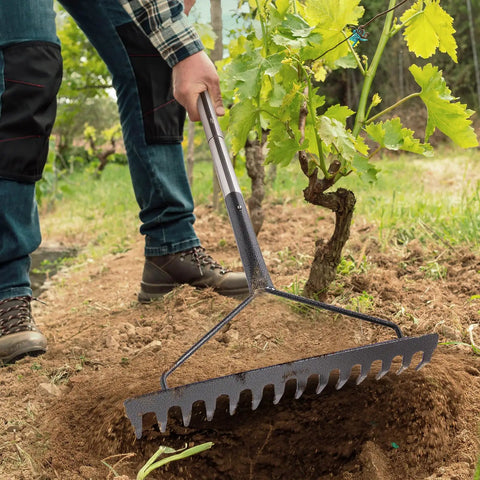 Person using Sturdy Metal Garden Rake With Extra Long Adjustable Handle 71 Inch 18 Inch Wide Head 14 Tines for yard work