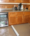 Plastic Carpet Protector Film 36 Inch By 200 Feet Heavy Duty Floor Shield shown in kitchen setting on carpet floor