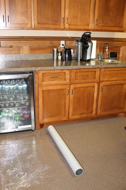 Plastic Carpet Protector Film 36 Inch By 200 Feet Heavy Duty Floor Shield shown in kitchen setting on carpet floor