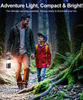Man and child hiking in forest with Ultra Bright LED Camping Lanterns 4 Pack for Power Outages