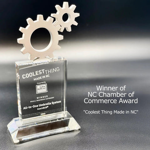 All-In-One Beach Umbrella System With Ultra Base Deep Ocean Blue Seven Point Five Foot Canopy award for "Coolest Thing Made in NC."