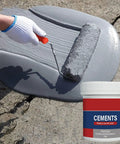 Quick Dry Concrete Patch 300g for crack sealing and floor repair filler DIY friendly, being applied with a roller on a cracked surface