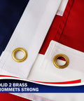 Close-up of brass grommets on American Flag 3x5 Outdoor Heavy Duty Flag With Embroidered Stars And Sewn Stripes, Fade Resistant Exterior