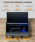 Open biometric pistol safe with quick access fingerprint and interior light, showing space for one large pistol on wooden surface.