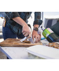 Using Stowe Fixed Blade Knife from Hike Kit Essentials With Armbar Cork Multitool Featuring Eight Tools in outdoor kitchen setup