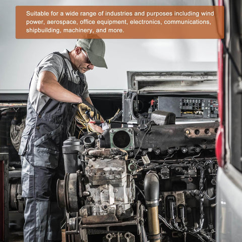 Technician working on machinery in an industrial setting, focusing on electronics and mechanical components, indicating versatility in industries.