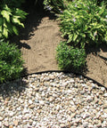 Aluminum Landscape Edging Kit For Lawn And Garden 8 Edging Pieces With Spikes 48 Feet Total Black Rustproof And Maintenance Free No Fuss Install For Straight Lines Or Curves DIY Friendly installed in garden with stones and plants