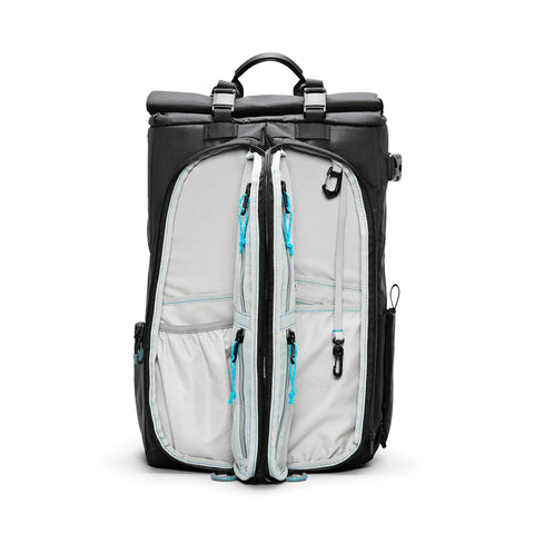 Open view of City Commuter Camera Backpack With 18 Liter Rolltop Closure showing multiple interior compartments for gear and accessories.