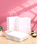 White Kraft Paper Gift Bags With Handles Pack Of 25 Medium 8 By 4.5 By 10 Inches Tough Durable Recyclable Shopping Bags