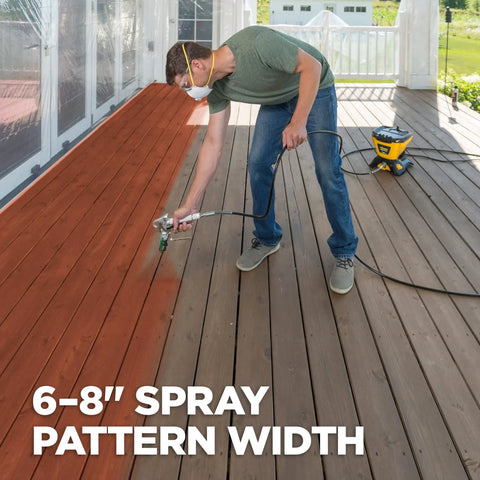 Person using High Efficiency Airless 313 Reversible Spray Tip for Sealers and Stains on deck, demonstrating 6 to 8 inch coverage.
