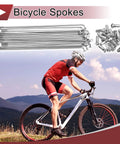 Image of cyclist with Twenty Pack 12G Bicycle Spokes Set, 130mm Length, Silver Galvanized Carbon Steel Wheel Spokes For Most Rims.