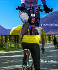 Cyclist with 8 pack bike front and rear reflectors kit for bicycle wheel spoke reflectors set in red and white color for road safety.