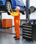 Mechanic with 5 Drawer Rolling Tool Chest With Lock Built To Last Beast Tough Heavy Duty Steel Toolbox near car lift