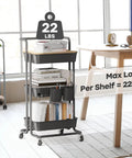 Three Tier Rolling Utility Cart With Cover Top And Wheels For Office Kitchen Bathroom On The Go Storage Cart Includes Three Baskets Six Hooks Three Cups And A Lid Top For Laptop Coffee Crafts And More Black in home office setting.