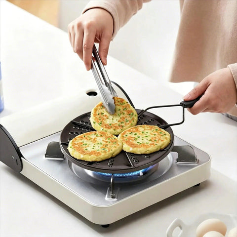 Person using 7.5 Inch Colombian Budare Arepa Grill for Stovetop and Gas Stove, Perforated Design for Grilling Up Crispy Arepas
