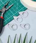Four bicycle safety washers from the Eight Pack Bicycle Axle Nut And Safety Washer Kit for quick easy DIY bike repairs.