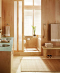 Bathroom interior with 22 Inch Wide Glass Bathroom Vanity Shelf In Brushed Nickel For Towels And Accessories mounted on wall.
