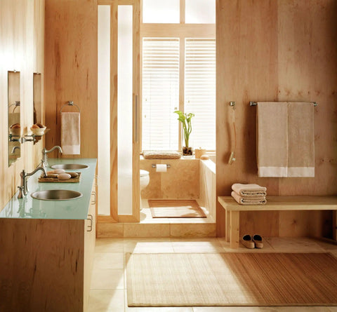 Bathroom interior with 22 Inch Wide Glass Bathroom Vanity Shelf In Brushed Nickel For Towels And Accessories mounted on wall.