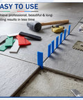 60 Piece Plastic Glazing Blocks And Flat Shims Three Sixteenths To Fifteen Sixteenths Inch arranged on tile floor for precise leveling during installation.