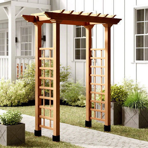 Six Pack Heavy Duty Fence Post Anchors And Ground Spikes Rock Solid 24 Inch Metal Stakes in outdoor setting with wooden trellis.