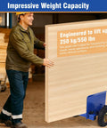 Heavy Duty Drywall Cart And 550 Lb Panel Mover With Smooth Rolling Pneumatic Wheels used to lift a 550 lb panel by a worker.