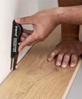 EasyScribe Scribing Tool for Accurate Layouts Across Carpentry, Joinery, Tiling, Kitchen Fitters, and Shop Fitters with a Pro Grade Adjustable Offset Arm From 0.04 to 1.57 Inches, Black in use on wooden surface