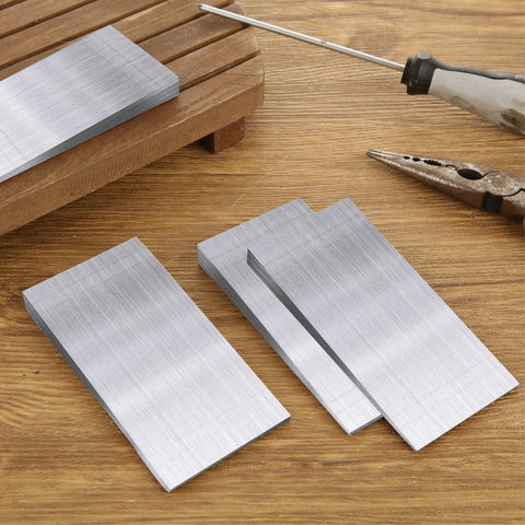 12 Pcs Steel Flange Wedge Set, 4 In By 2 In Triangle Metal Wedges Shims for Lathes and Welding Machines on wooden surface