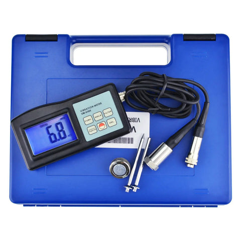 Hella Reliable Digital Vibration Meter Gauge And Analyzer For Heavy Industrial Machinery, portable handheld device with display and accessories.
