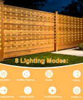 Outdoor Solar Curtain Lights 200 LED Warm White, 13ft By 3.9ft Waterproof String Lights on wooden fence at night.
