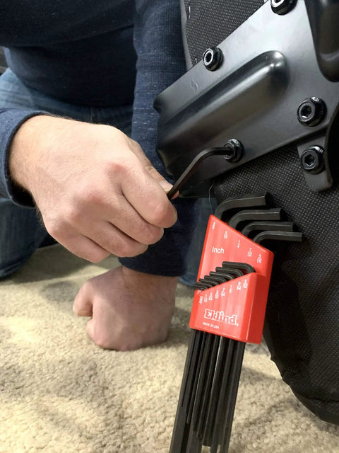 Person using Long Series Hex L Key Allen Wrench Set 13 Piece SAE Inch Sizes From.050 To 3 Eighths Made In USA on machinery part