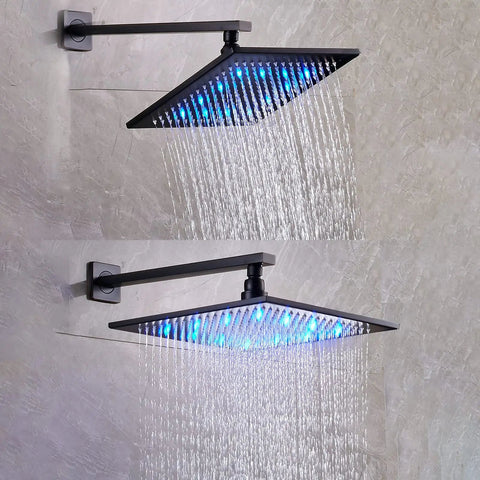 UMJIGF Shower System Black Led Digital Display Shower Faucet Set with Waterfall Tub Spout, 10 inch LED shower head in use.
