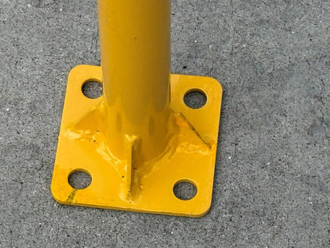 Dead Easy Osha Compliant Industrial Safety Railing With Vivid Yellow Finish And One Piece Welded Base Plates For Quick Plug And Play Surface Mounting base plate detail showing welded construction and mounting holes.